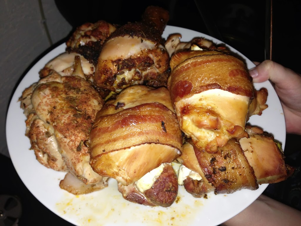 Finished Bacon Wrapped Chicken Stuffed with Jalapeno and Cream Cheese
