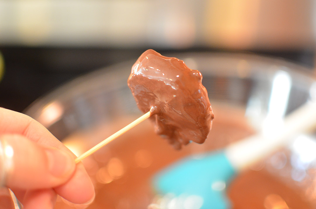 I use a toothpick to pull the bonbons out of the chocolate mix easily. 