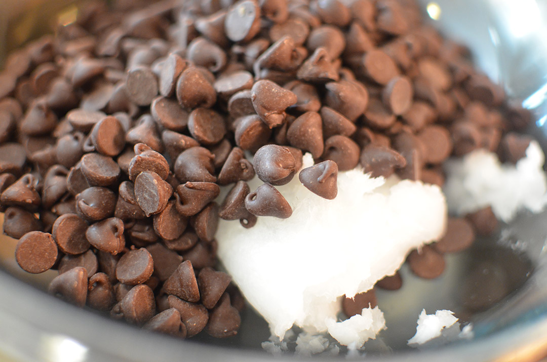 Mixing coconut oil with chocolate chips will give you a nice thickness for your exterior that easily coats.