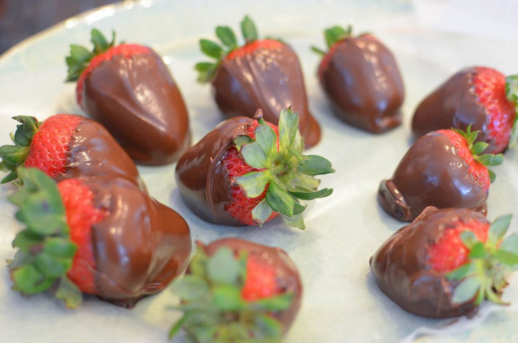 Once you're finished, place the chocolate covered strawberries in the fridge to completely harden. Keep them there until ready to serve for best crunch/taste.