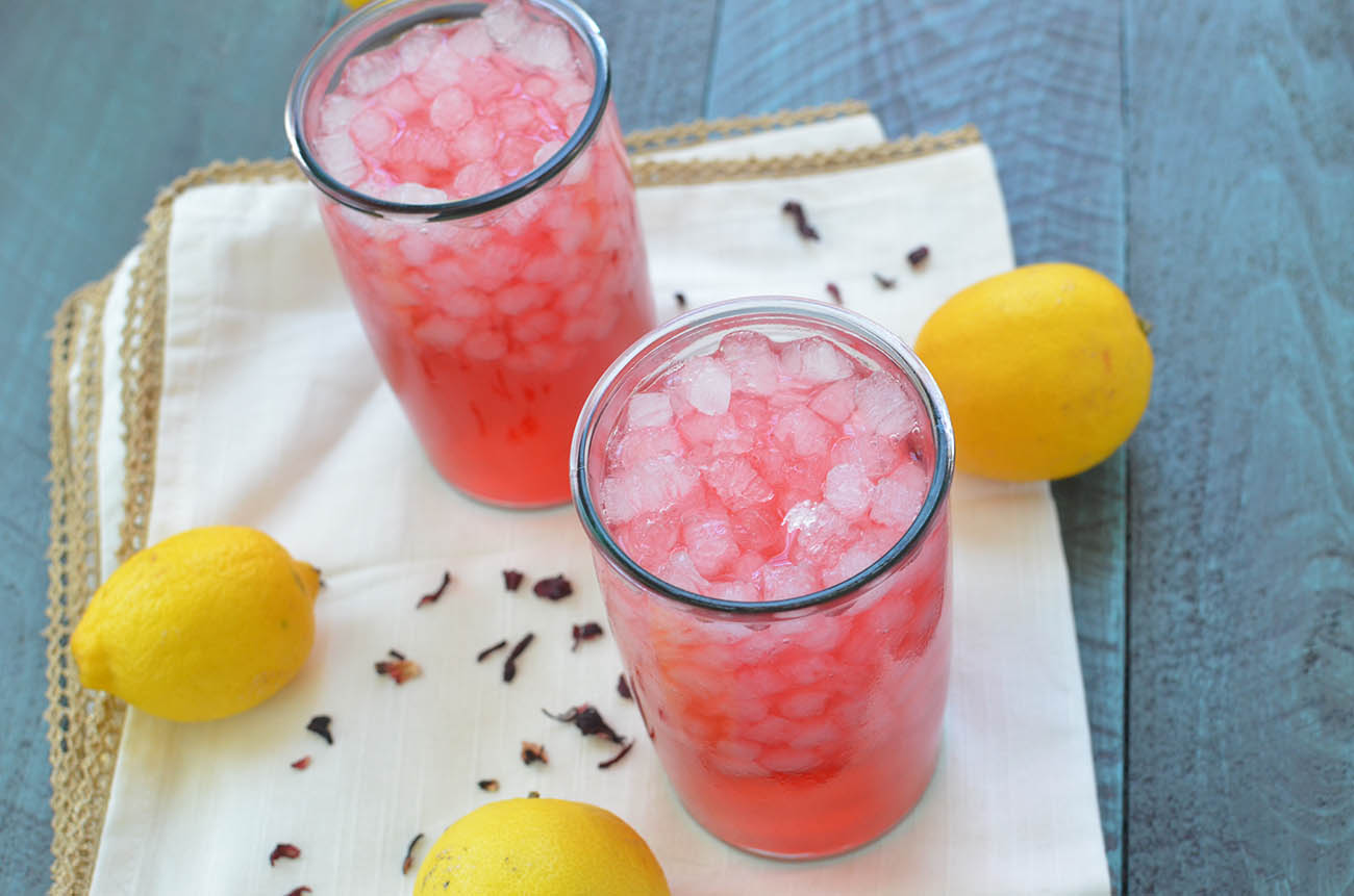 A refreshing summer drink made from fresh lemons and hibiscus petals
