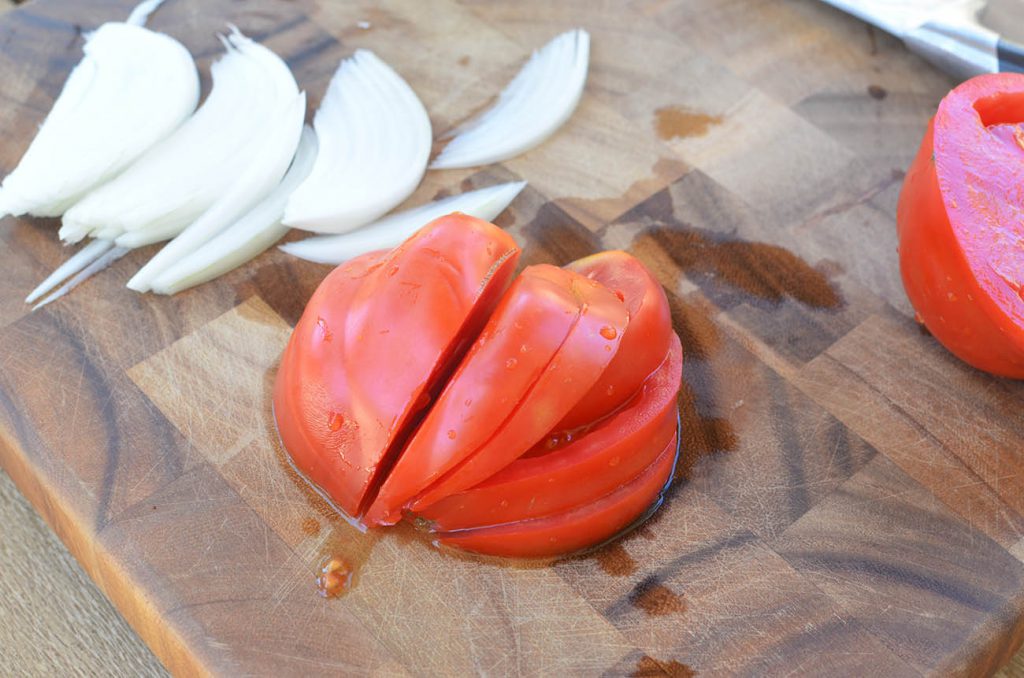 Ensalada Chilena! Slice your tomato vertically in thin, delicate slices.
